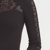//www.esterella.nl/cdn/shop/files/electric-waves-sg-top-a-manches-longues-col-roule-l-xl-nr0_1_compact.jpg