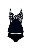 //www.esterella.nl/cdn/shop/products/MailyTankini8487_430Zwart-Wit_2_compact.jpeg